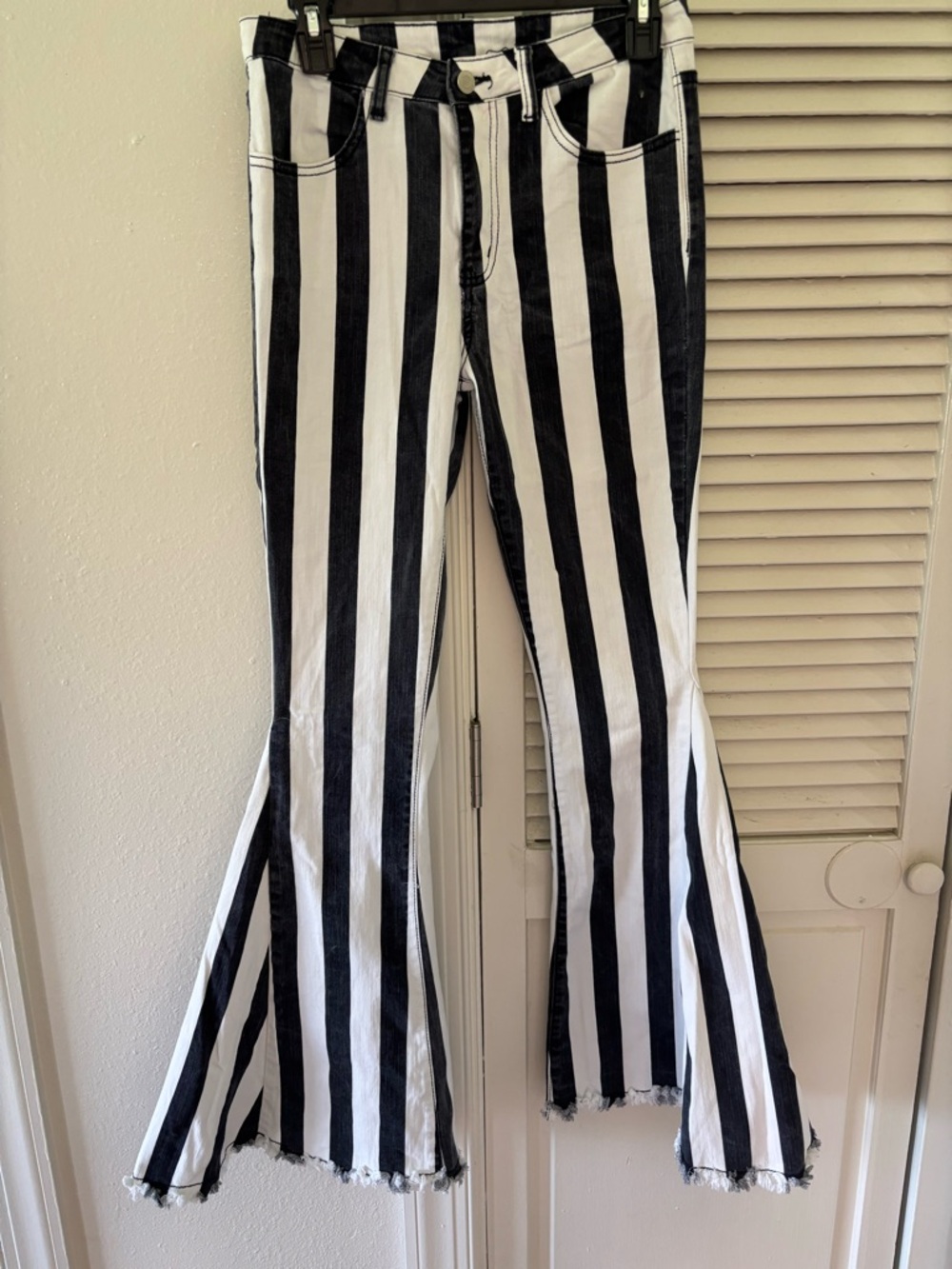 Black & White Vertical Stripe Flare Jeans - Women